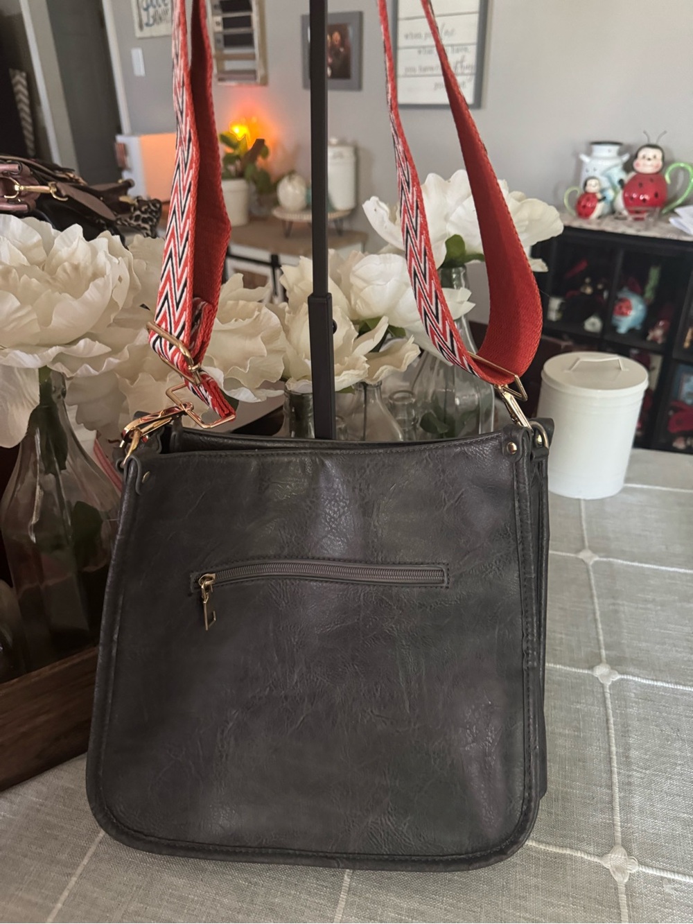 Classic Black Crossbody Bag with Red Accent Strap